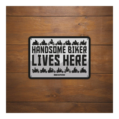 Oxford Garage Metal Sign: Handsome Biker Lives Here